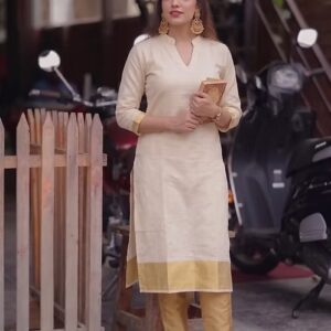 Golden kasavu tissue kurti standing view