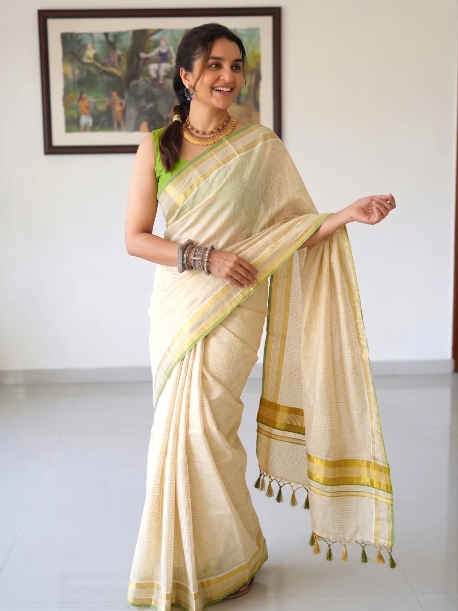 Traditional pea green tiny checks kasavu saree drape view