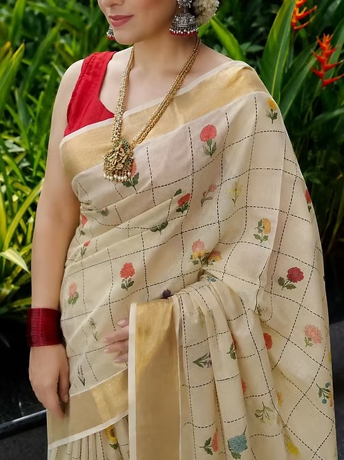 Bloomweave premium tissue kasavu saree closeup floral grid design